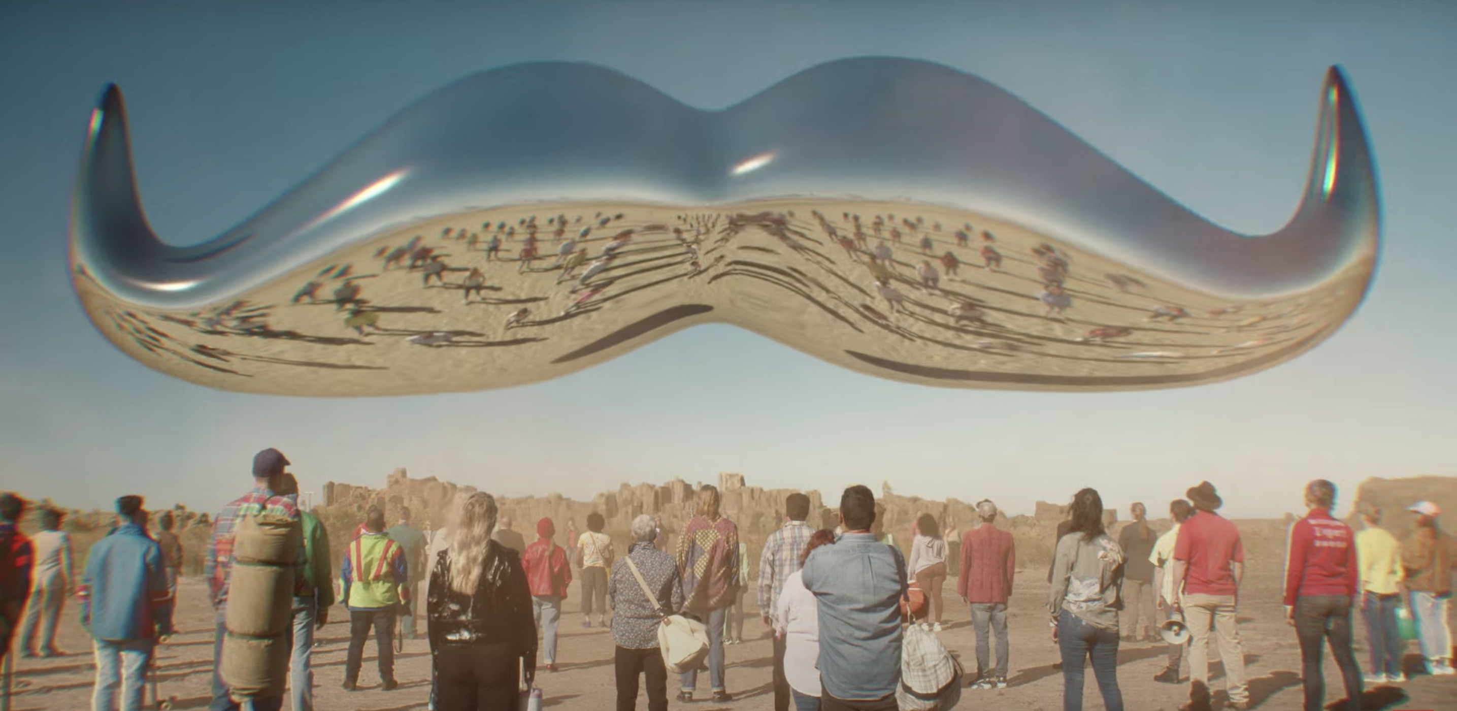 Movember worshippers gather in desert to hail coming of giant 'tache