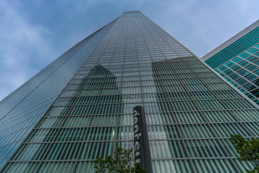 Dentsu slashes profit forecast, cuts international jobs as woes deepen