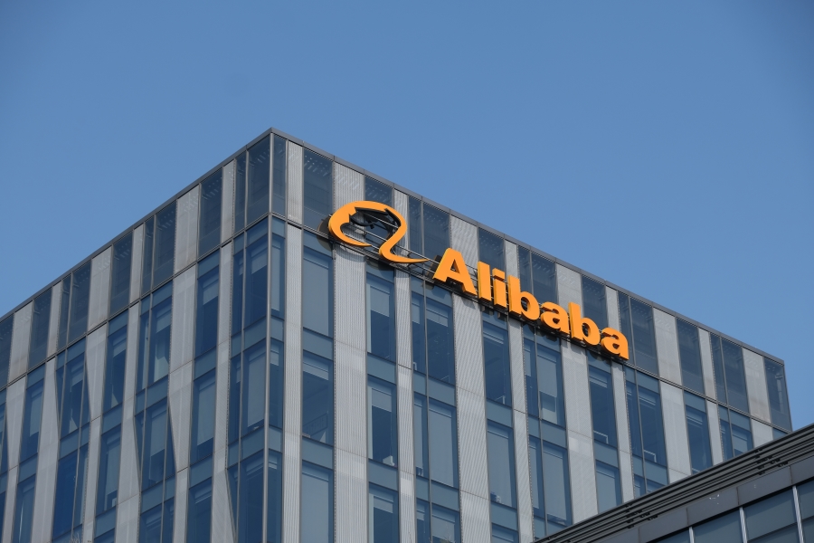 Alibaba pledges 'aggressive' AI investment, reports fastest growth in a year